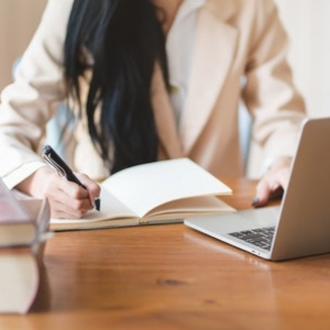 woman-writing-on-notebook-3803242-1.jpg